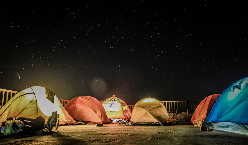 Tents pitched at night stargazing