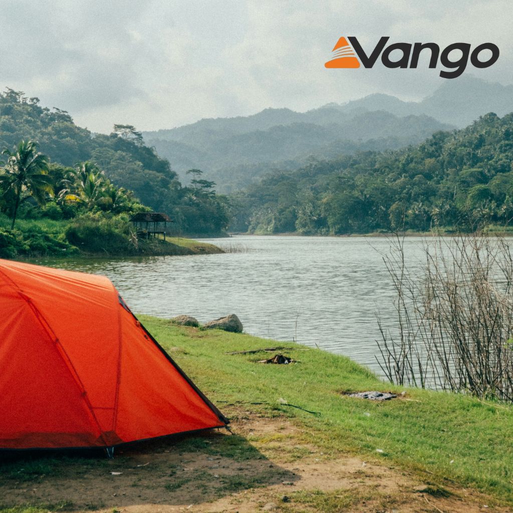 Vango tent in a lake near mountains